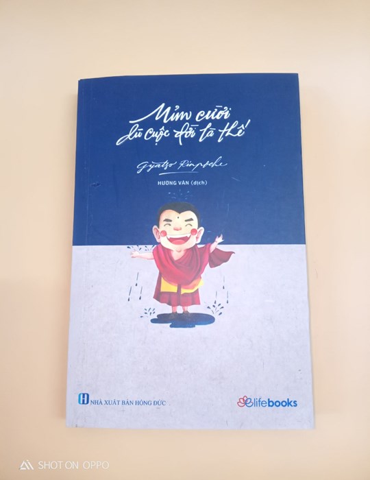 Mỉm cười dù cuộc đời là thế